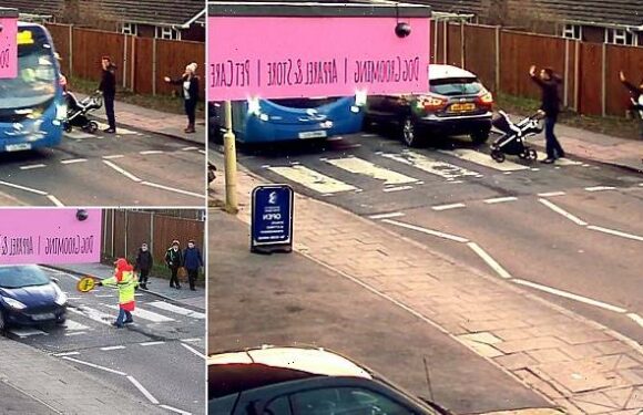 Father pushing his baby in a pram narrowly avoids being hit by a bus