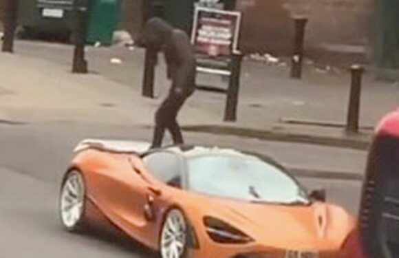 ‘Jealous’ man caught red-handed on camera stamping on £225,000 McLaren supercar