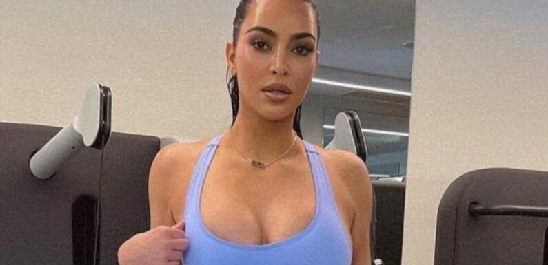Kim Kardashian nearly busts out of teeny baby blue catsuit & shows off very thin legs in new photo for Poosh | The Sun