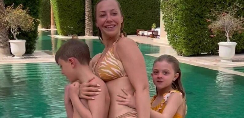 Laura Hamilton shows off her incredible figure in a bikini as she holidays in Abu Dhabi with her family | The Sun