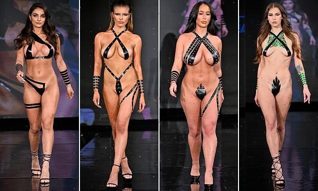 Models strut down the catwalk wearing nothing but tiny pieces of TAPE