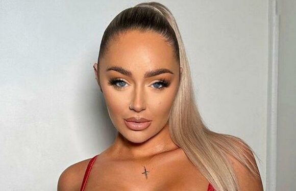 Page 3 model strips to kinky red lingerie to get Valentines Day-ready
