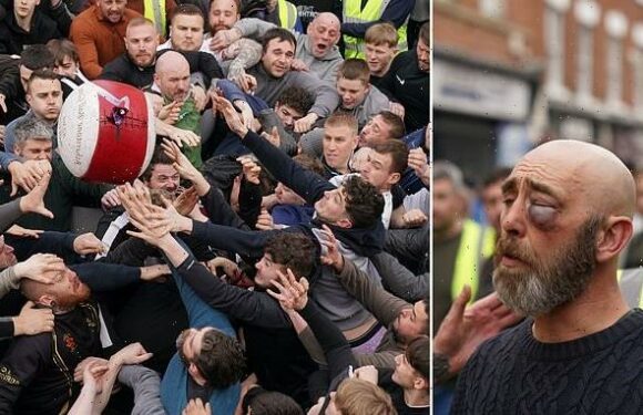 Pancake Day revellers throw punches during 'medieval football' game