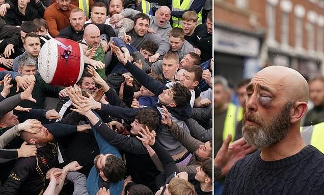 Pancake Day revellers throw punches during 'medieval football' game