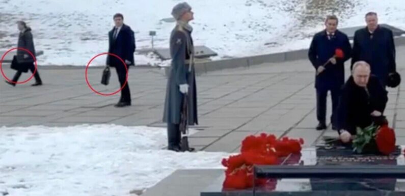 Putin brings nuclear football to war memorial