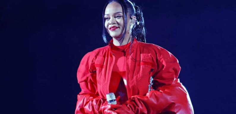 Rihanna fans are convinced she's pregnant after she shows 'bump' during Super Bowl Halftime performance | The Sun