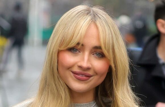 Sabrina Carpenter Dons Shiny Silver Boots During Rainy London Visit