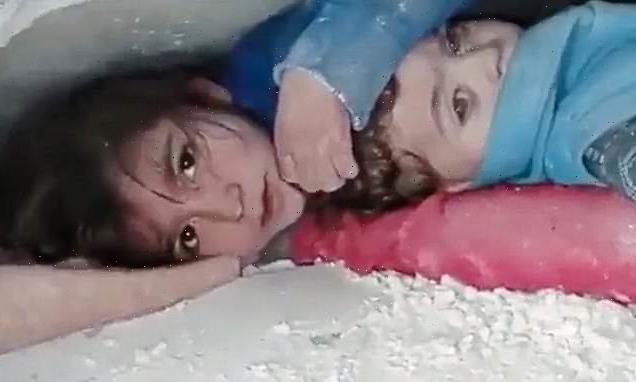 Syrian girl found protecting brother as they're rescued beneath rubble