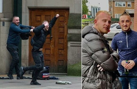 Two louts celebrate outside court as they avoid jail