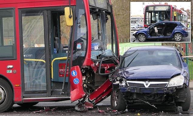 Two people are rushed to hospital after crash involving bus and a car
