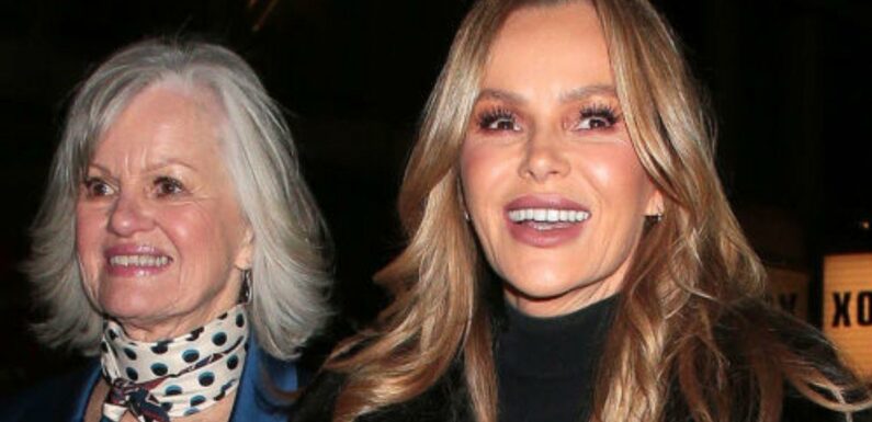 Amanda Holden flaunts cleavage in cut-out dress at show with mum