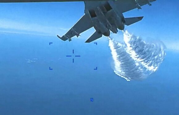 Gloating Russia gives MEDALS to reckless fighter pilots who downed US drone as they find wreckage | The Sun