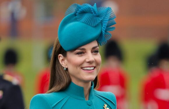 Kate follows tradition in turquoise coat for her debut as Colonel