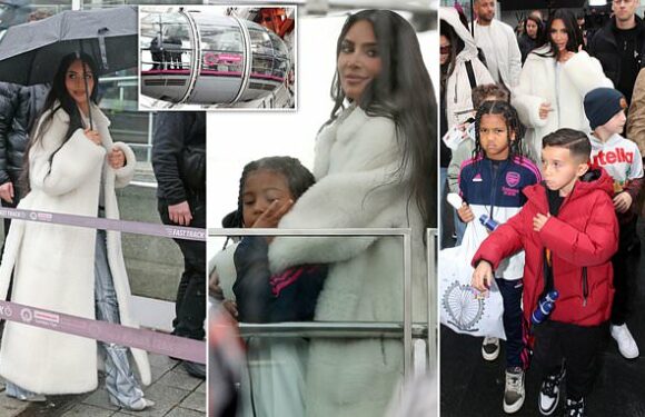 Kim Kardashian braves the rain to take son Saint, 7, on the London Eye