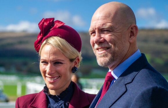 Loved up royals Mike and Zara Tindall arrive hand in hand in matching looks at races