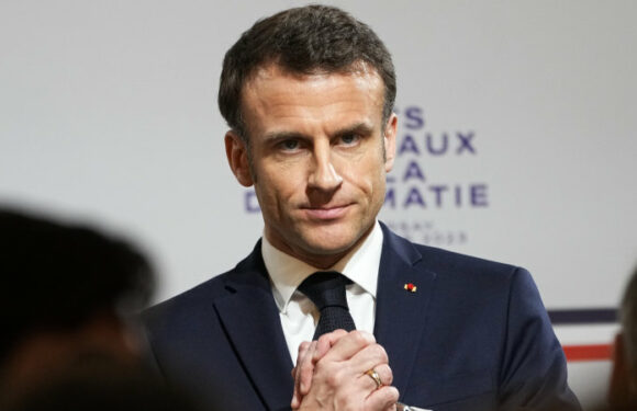 Macron narrowly survives no confidence motion amid violent pension protests