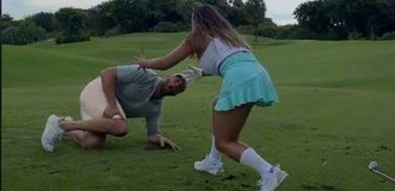 Mortified Playboy model hits bloke in manhood with golf ball for hole in one