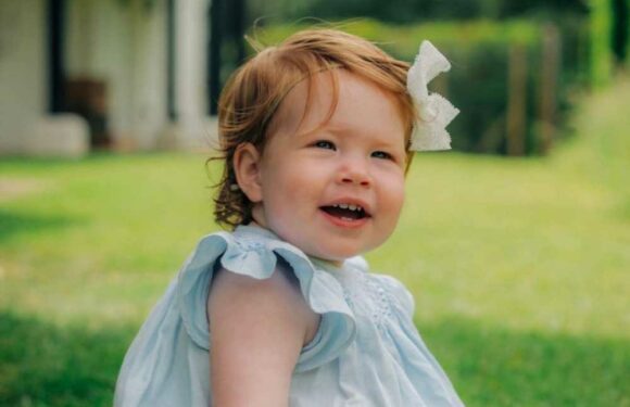 Mystery over Lilibet's godmother as Meghan Markle & Harry's daughter is christened with her famous godfather by her side | The Sun