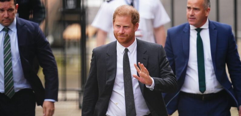 Prince Harry smiles and waves outside High Court as privacy claim hearing nears end