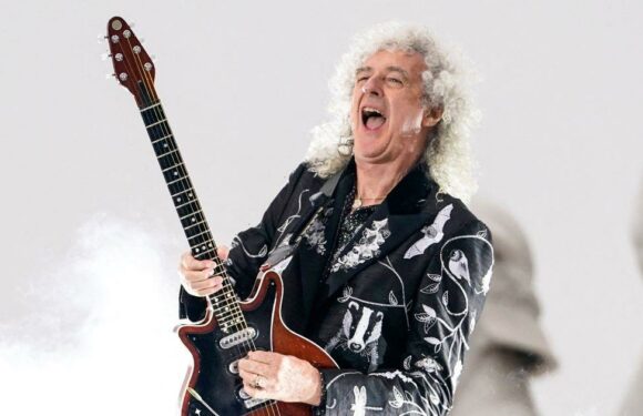 Queen guitarist Brian May among those receiving honours at Buckingham Palace