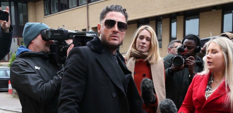 Stephen Bear poses for selfies and sings outside court ahead of revenge porn sentencing