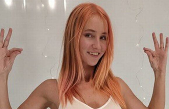 Yoga instructor makes fortune by charging fans to watch her strike sexy poses