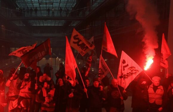 French protesters armed with flares take over Paris office