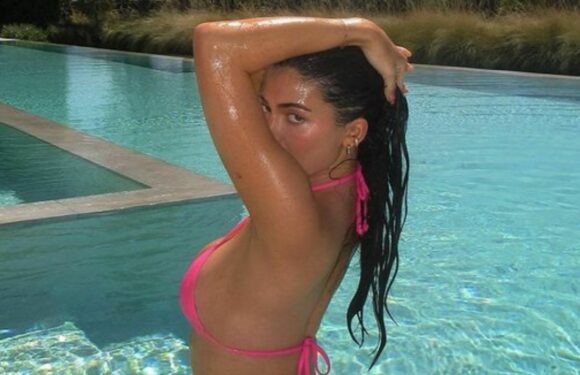Kylie Jenner shows off sultry curves in hot pink bikini