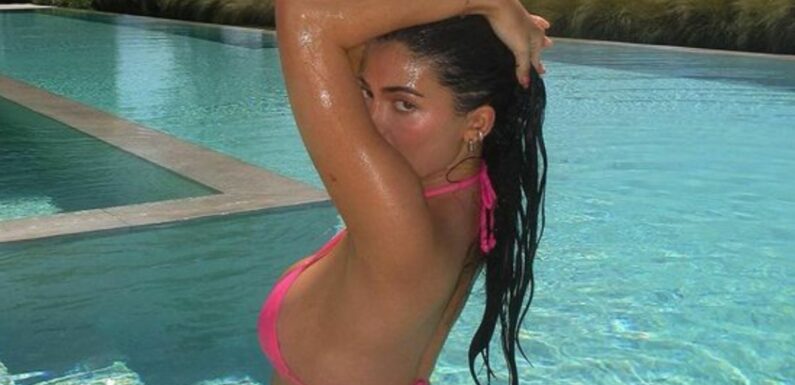 Kylie Jenner shows off sultry curves in hot pink bikini