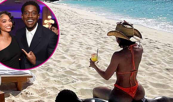 Lori Harvey Sunbathes on Top of Boyfriend Damson in Sexy Orange Bikini: Pics