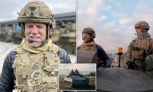 Mike Tindall spends day driving Warrior tank around MOD base