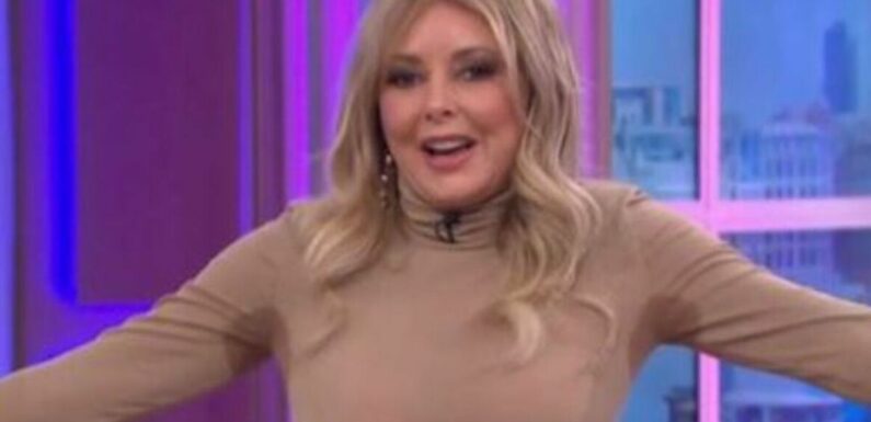 Carol Vorderman shimmies in skintight top during This Morning dance party