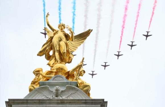 Moment Red Arrows fly over Buckingham Palace after being forced to scale back coronation display due to weather | The Sun