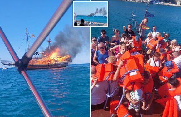 Dramatic moment tourists are rescued after abandoning Greek boat