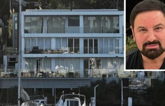 Across the water from his palatial mansion, developer’s empire in $1b implosion