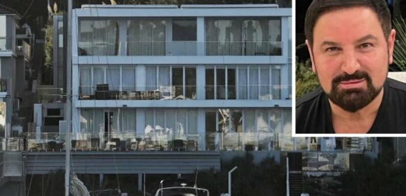 Across the water from his palatial mansion, developer’s empire in $1b implosion