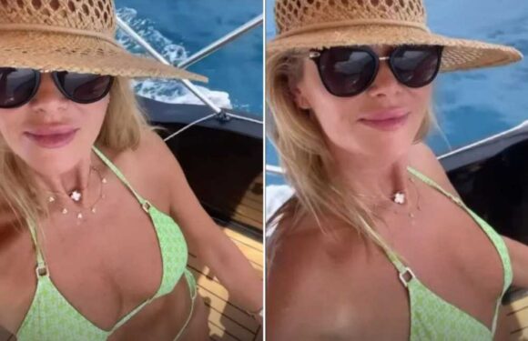 Amanda Holden stuns as she strips off to a green bikini to drive a speedboat on holiday | The Sun