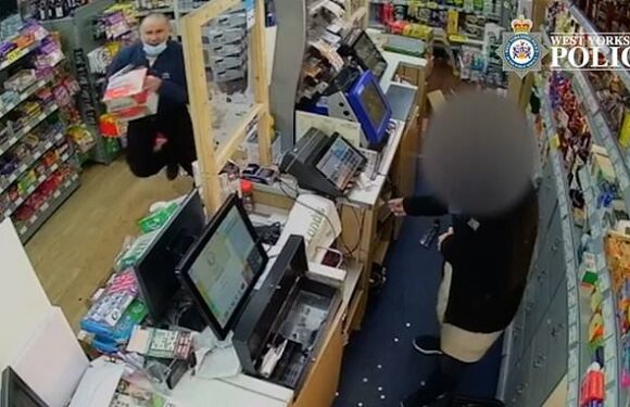 CCTV shows have-a-go-hero saving shop workers from armed robbers