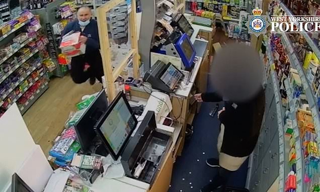 CCTV shows have-a-go-hero saving shop workers from armed robbers
