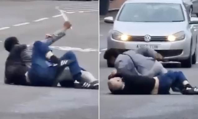 Dramatic moment man wrestles with knife-wielding thug