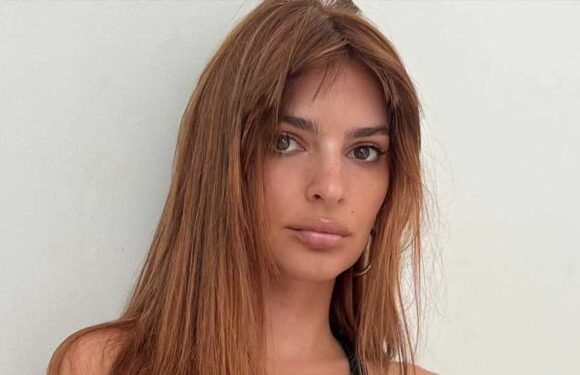 Emily Ratajkowski almost suffers wardrobe malfunction in barely-there bikini as she sprawls on the floor for sexy pic | The Sun