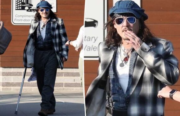 Johnny Depp, 60, seen using cane at Boston gig after injuring ankle
