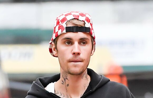 Justin Bieber looks stressed as he’s caught smoking while alone on NYC sidewalk in bizarre new pics without wife Hailey | The Sun