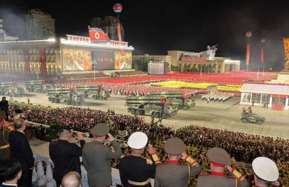 Kim Jong-un shows off new ballistic nuke missiles & drones in warning to West after US moves nuke sub to region | The Sun