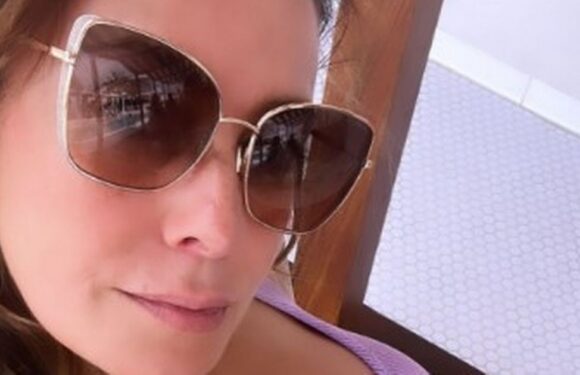 Kym Marsh swaps rainy UK for exotic location as she holidays with daughter Polly, 12