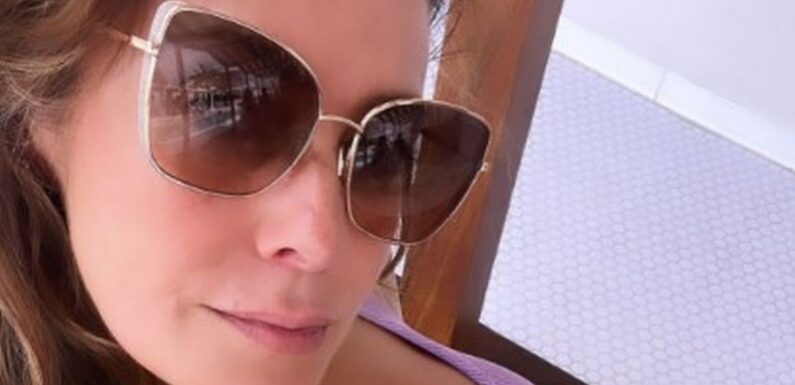 Kym Marsh swaps rainy UK for exotic location as she holidays with daughter Polly, 12