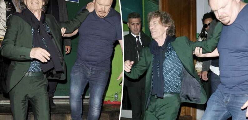 Mick Jagger needs assistance leaving star-studded 80th birthday bash in London