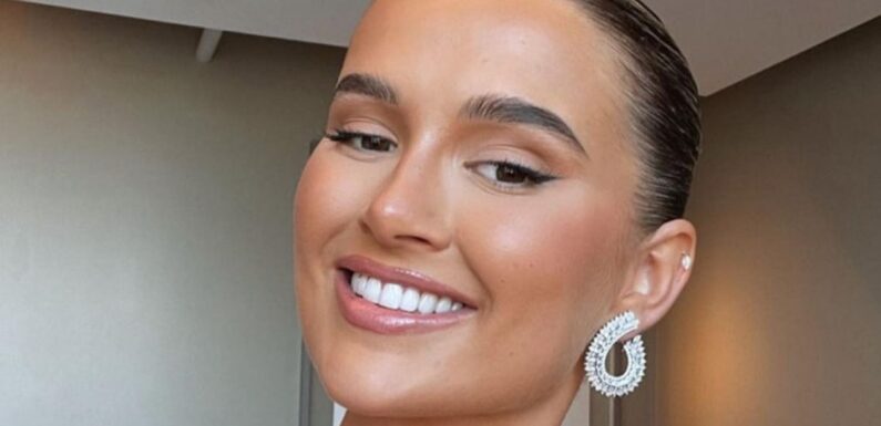 Molly-Mae shows off stunning diamond engagement ring worth £1 million on the beach