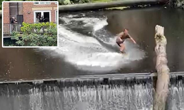 Moment thrill-seeker waterskis across weir on the River Wear in Durham