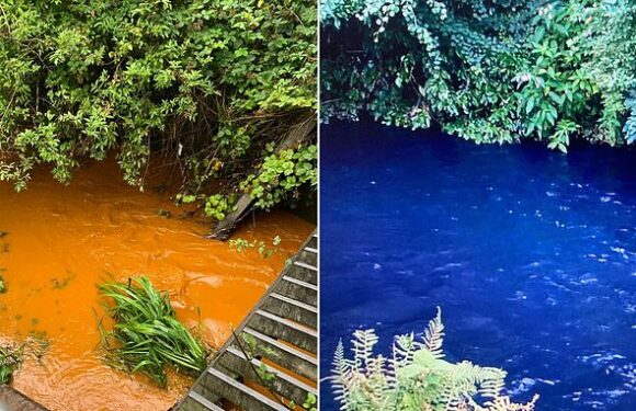 Part of the River Trent has turned electric blue and bright orange